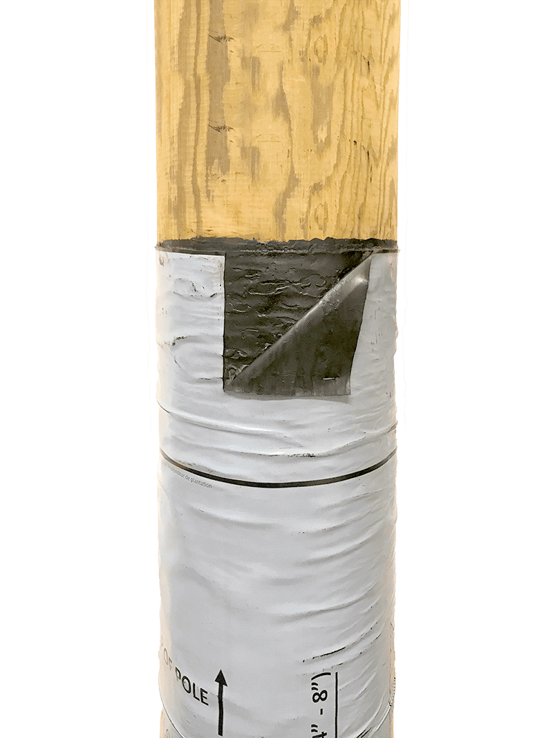 Polesaver Sleeve Peelback small 2 Image showing a cut-away of a Polesaver sleeve on a wooden utility pole