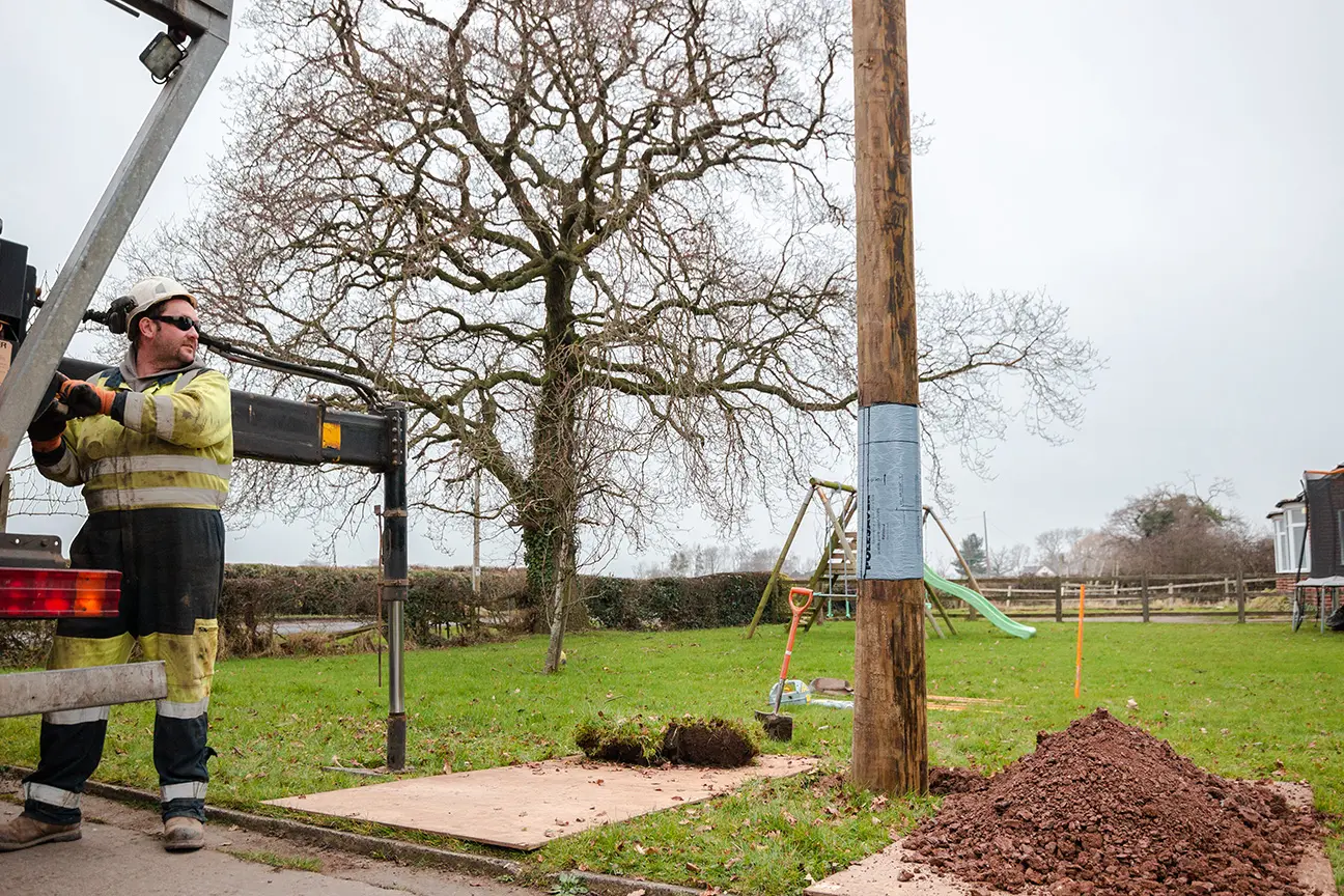 Polesaver protected pole being installed
