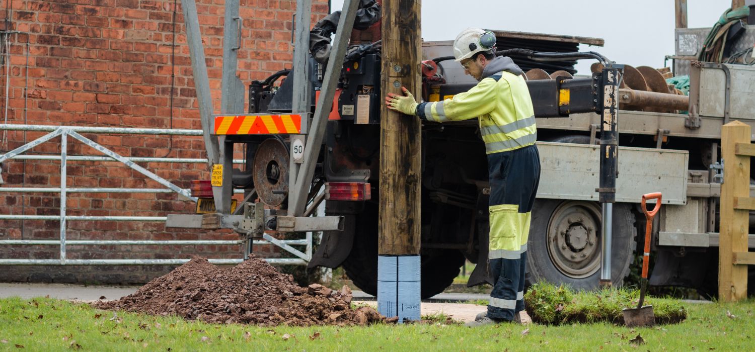 Polesaver protected poles being installed